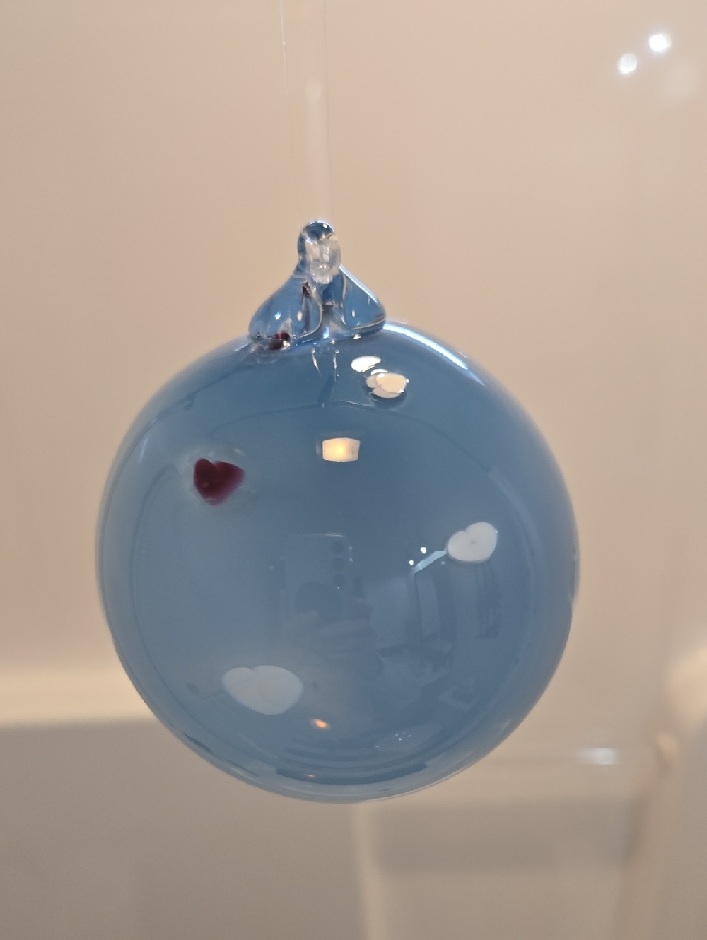 Handblown Blue Glass Ornament with Heart Accents